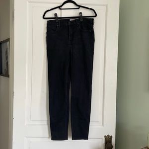Black high rise ankle cropped jeans by everlane.